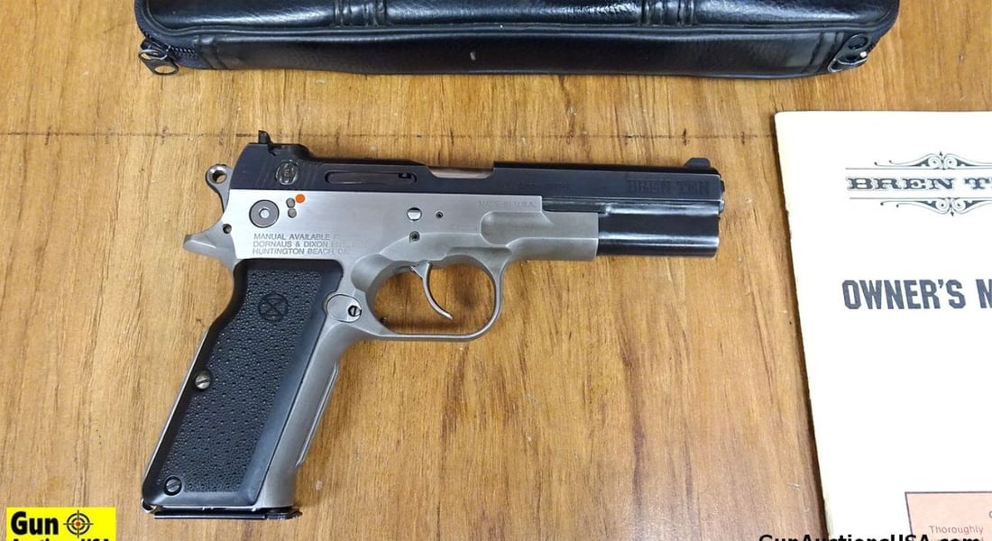 DORNAUS & DIXON BREN TEN 10MM AUTO Semi Auto Pistol. Very Good. 5" Barrel. Shiny Bore, Tight Action: DORNAUS & DIXON BREN TEN 10MM AUTO Semi Auto Pistol. Very Good. 5" Barrel. Shiny Bore, Tight Action RARE FIREARM, Two Tone 10MM with Blued Slide, Stainless Satin Finish Frame, Iron Sights, Includes On