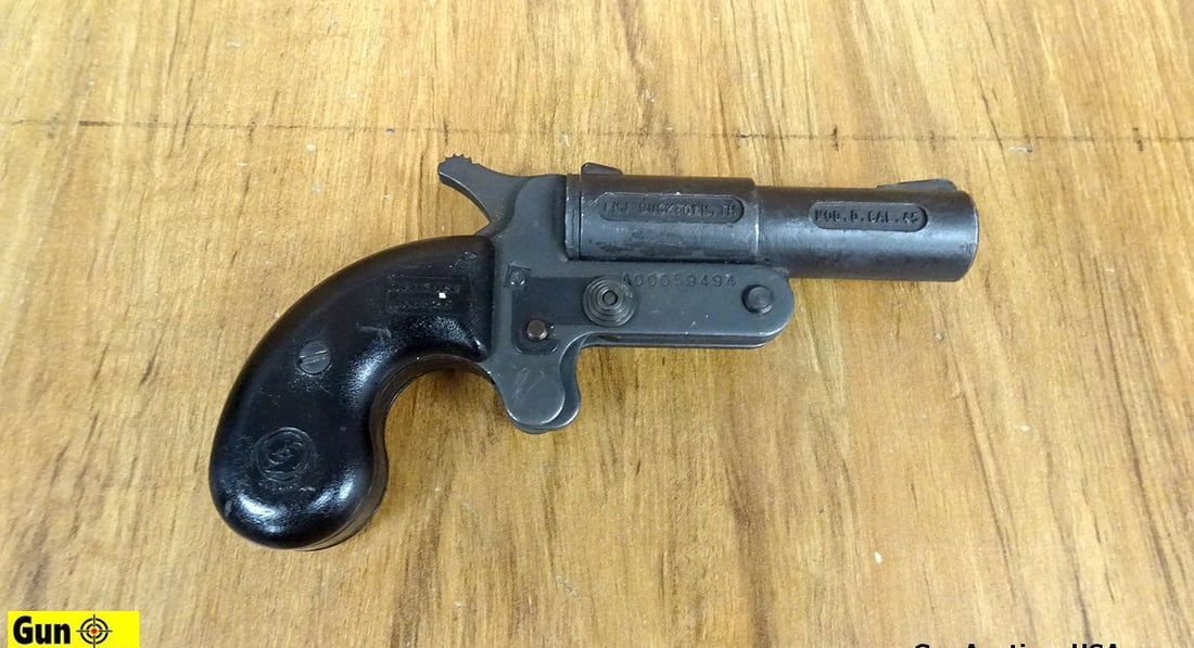 COBRAY MOD D .45 Single Shot Pistol. Good Condition. 3.5" Barrel. Shiny Bore, Tight Action Single: COBRAY MOD D .45 Single Shot Pistol. Good Condition. 3.5" Barrel. Shiny Bore, Tight Action Single Shot Derringer Style, Synthetic Grips with Cobray Logos. Will Also Except .410 Ammo. . SN: A00059494 U