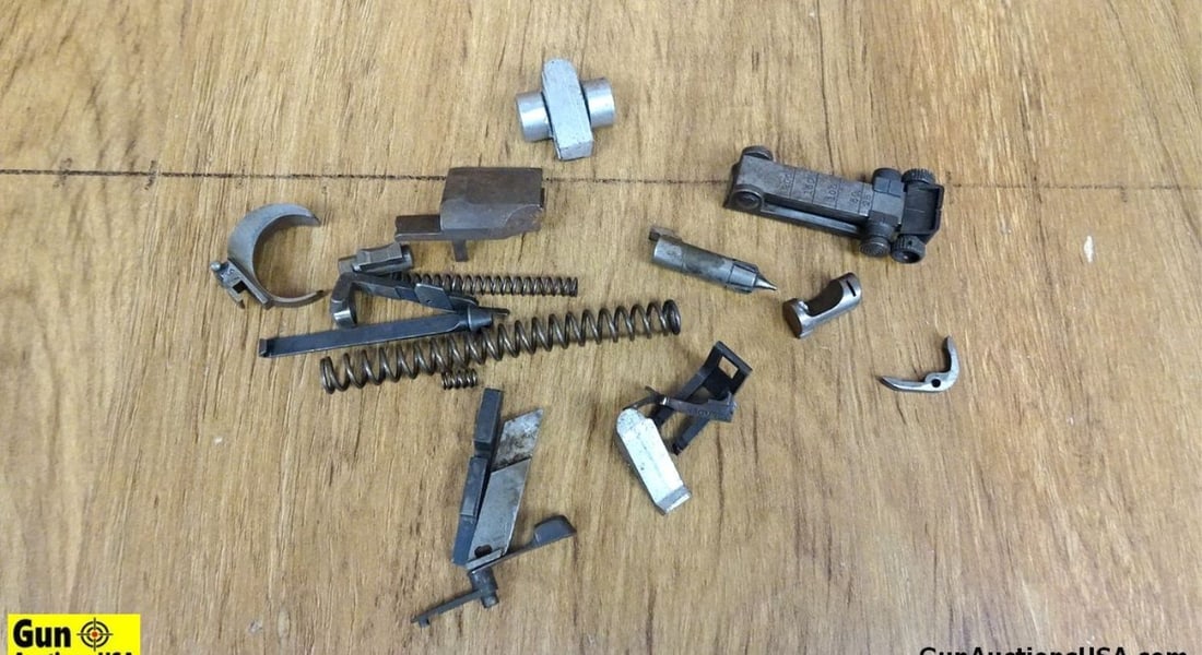 Parts Kit. Good Condition. P08 Parts Kit, Assorted Luger Parts. Includes Safety Bar, Adjustable Rear: Parts Kit. Good Condition. P08 Parts Kit, Assorted Luger Parts. Includes Safety Bar, Adjustable Rear Sight, Aluminum Magazine Base, Mainspring, Trigger, Extractor, Etc. . (54082)