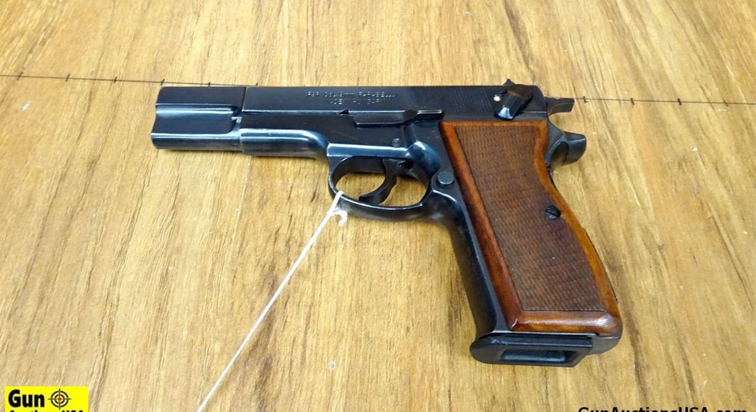 HUNGARIAN P9R 9MM PARA Semi Auto Pistol. Very Good. 4 5/8" Barrel. Shiny Bore, Tight Action Very: HUNGARIAN P9R 9MM PARA Semi Auto Pistol. Very Good. 4 5/8" Barrel. Shiny Bore, Tight Action Very Nice SA/DA with De-Cocker Safety, Very Nice Blued Finish, Beautiful Wood Checkered Grips. Front Blade S
