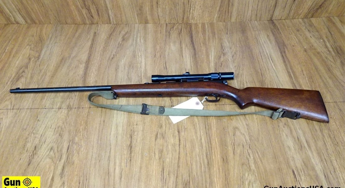 Winchester 74 .22 CAL Semi Auto Rifle. Fair Condition. 22" Barrel. Shiny Bore, Tight Action Features: Winchester 74 .22 CAL Semi Auto Rifle. Fair Condition. 22" Barrel. Shiny Bore, Tight Action Features a Front Blade Sight, Notch Adjustable Rear Sight, Straight Grained Wood Stock, Tubular Fed Magazine