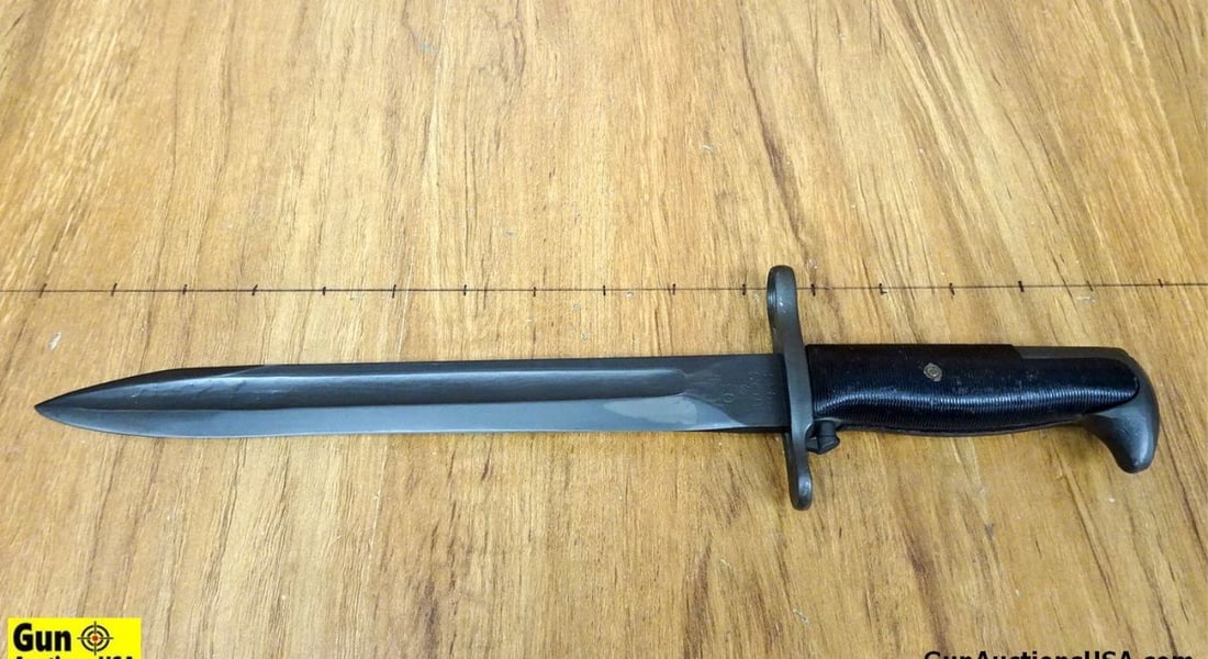 Military Surplus RARE & COLLECTIBLE Bayonet. Very Good Condition. One 1943 Oneida Limited M1 Garand: Military Surplus RARE & COLLECTIBLE Bayonet. Very Good Condition. One 1943 Oneida Limited M1 Garand Bayonet and Scabbard. "FLAMING BOMB" Stamp on Left Side Rear of Blade, Dated 1943. FLAMING BOMB STAM
