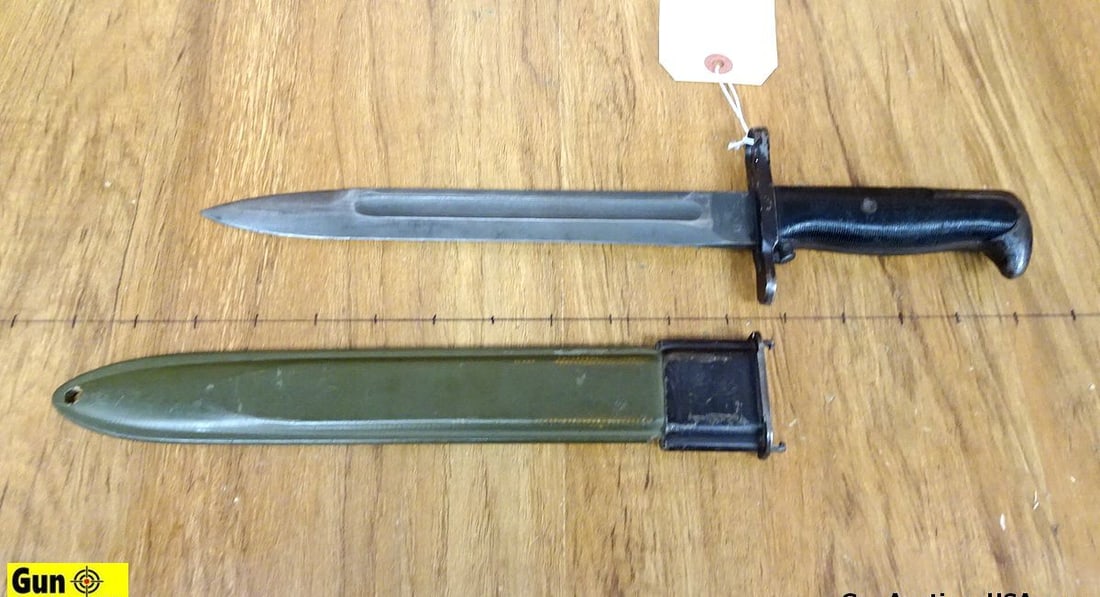 U.S. BOMB STAMPED Bayonet. Good Condition. U.S. Bayonet with a 10" Blade, 14 5/8" Overall. Oval: U.S. BOMB STAMPED Bayonet. Good Condition. U.S. Bayonet with a 10" Blade, 14 5/8" Overall. Oval Circle with PAL, with FLAMING BOMB in Middle of the U.S. Stamp. Includes Metal Scabbard with FLAMING BOM