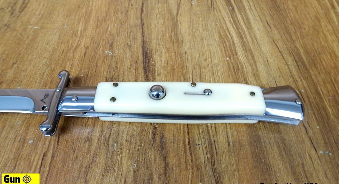 KC Knife. Excellent. One Very Nice, Switch Blade Knife, 4.25" Blade, 10" Overall. Faux Ivory Grips.: KC Knife. Excellent. One Very Nice, Switch Blade Knife, 4.25" Blade, 10" Overall. Faux Ivory Grips. . Italy (66742)