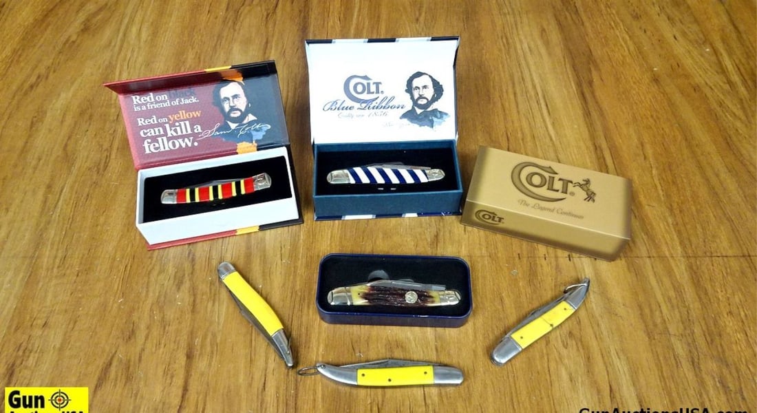 Colt, Sabre Knives. Excellent. Lot of 7; Three Sabre Knives and (Four Gorgeous Colt Knives in: Colt, Sabre Knives. Excellent. Lot of 7; Three Sabre Knives and (Four Gorgeous Colt Knives in Presentation Boxes. One Coral Snake Series, One Blue Ribbon, One Samuel Colt, and One 175Th Anniversary, I