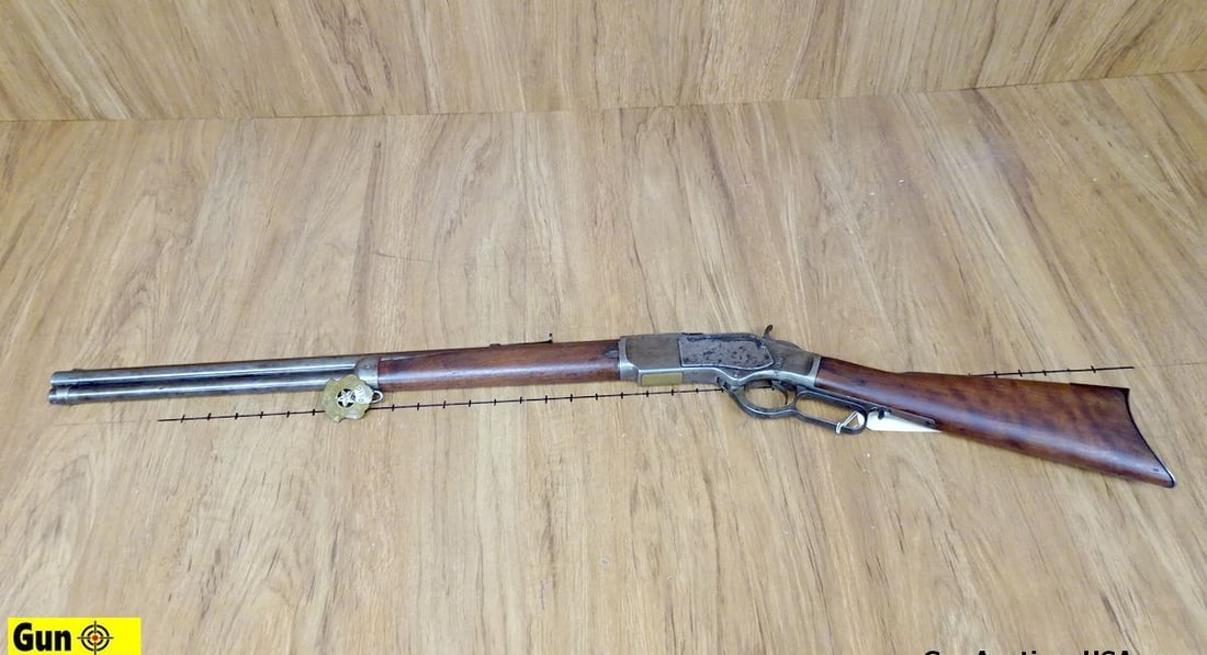 Winchester 1873 44-40 Lever Action 1873 COLLECTOR Rifle. Good Condition . 23" Barrel. Shootable: Winchester 1873 44-40 Lever Action 1873 COLLECTOR Rifle. Good Condition . 23" Barrel. Shootable Bore, Tight Action Straight Grained Wood Furniture, Sling Swivel, Front Blade sight, Adjustable Rear Not