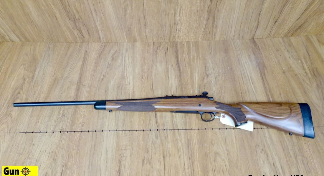 REMINGTON 700 243 WIN Bolt Action JEWELED BOLT Rifle. NEW. 24" Barrel. GORGEOUS Wood Furniture with: REMINGTON 700 243 WIN Bolt Action JEWELED BOLT Rifle. NEW. 24" Barrel. GORGEOUS Wood Furniture with Checkered Pistol Grip and Foregrip. Matte Black Finish on Barrel and Receiver, BEAUTIFUL JEWELED BOL