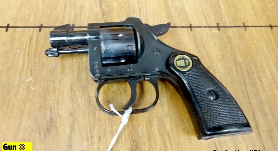 ROHM RG7 .22 CAL Revolver. Very Good. 1 3/8" Barrel. Shiny Bore, Tight Action SA/DA, 6 Shot Fluted: ROHM RG7 .22 CAL Revolver. Very Good. 1 3/8" Barrel. Shiny Bore, Tight Action SA/DA, 6 Shot Fluted Cylinder with a Front Blade Sight, Notch Rear Frame Sight. Dark Polymer Checkered Grips with Factory 