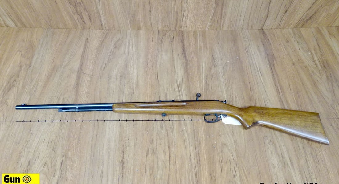 Stevens 66 .22 S-L-LR Bolt Action Rifle. Very Good. 24" Barrel. Shiny Bore, Tight Action Blued: Stevens 66 .22 S-L-LR Bolt Action Rifle. Very Good. 24" Barrel. Shiny Bore, Tight Action Blued Receiver, Barrel and Magazine Tube, with Nice Straight Grained Wood Stock. Front Blade Sight, Adjustable 