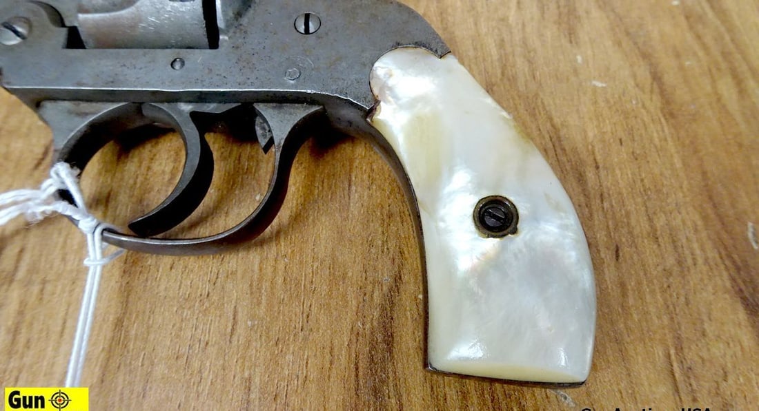 NATIONAL ARMS TOPBREAK .32 S&W CTG Revolver. Needs Repair. 3" Barrel. Shiny Bore, Tight Action: NATIONAL ARMS TOPBREAK .32 S&W CTG Revolver. Needs Repair. 3" Barrel. Shiny Bore, Tight Action DA/SA, Front Blade Sight, Notch Rear Sight,Faux Fox Pearl Grips. Needs Repair. Cylinder To Barrel Head Sp