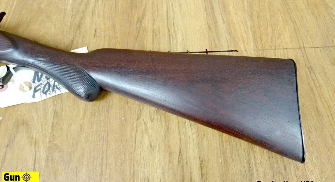 NMN .22 CAL Rolling Block Rifle. Needs Repair. 22 5/8" Barrel. Shootable Dark Bore Straight Grained: NMN .22 CAL Rolling Block Rifle. Needs Repair. 22 5/8" Barrel. Shootable Dark Bore Straight Grained Wood Stock, Single Shot, with a Octagon Barrel, and a Metal Butt Plate. Loading Breech Needs Repair.