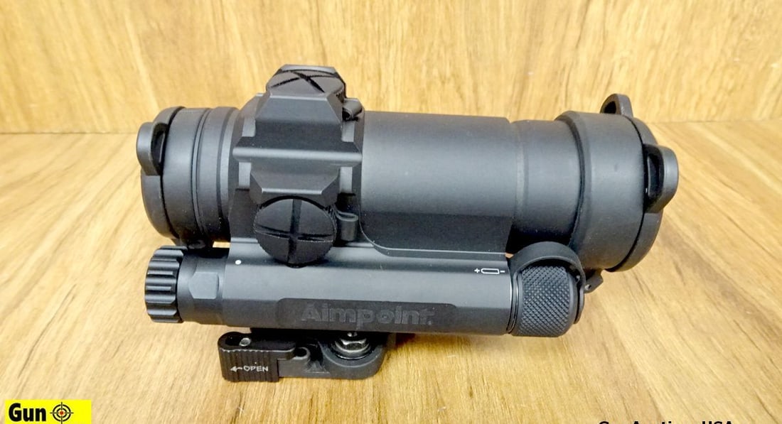 AIMPOINT COMP M4S 2MOA Sight. Very Good . Red Dot Optic Sight with Flip Up Covers, Mounted on a: AIMPOINT COMP M4S 2MOA Sight. Very Good . Red Dot Optic Sight with Flip Up Covers, Mounted on a Larue Tactical Quik Release Mount. Includes Box and papers. . (66411)