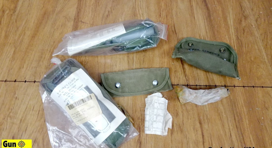 U.S. Military Surplus Holsters, Launcher Sight, Etc. . Good Condition . Lot of 5; Two M12 Holsters,: U.S. Military Surplus Holsters, Launcher Sight, Etc. . Good Condition . Lot of 5; Two M12 Holsters, One US 1945 Dated M15 Grenade Launcher Sight with Cloth Instructions. Also Includes Two Canvas Carry
