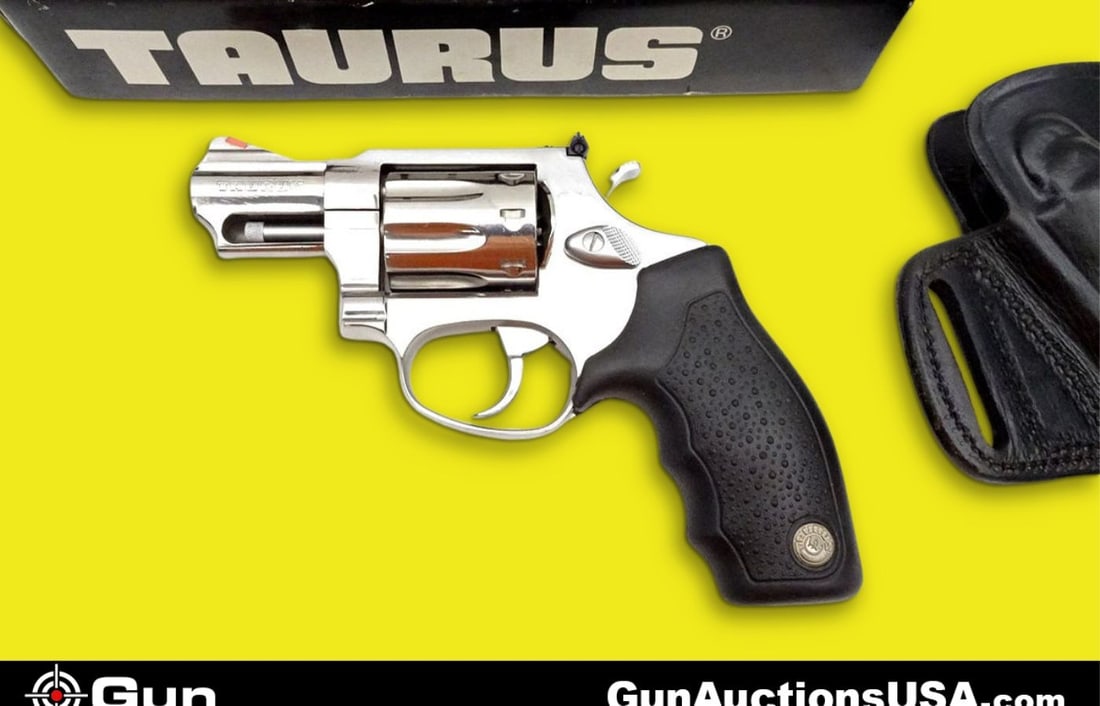 Taurus 941 .22 MAGNUM Revolver. Like New. 2" Barrel. DA/SA, with an 8 Round Fluted Cylinder, Red Ins: Taurus 941 .22 MAGNUM Revolver. Like New. 2" Barrel. DA/SA, with an 8 Round Fluted Cylinder, Red Insert From Ramp Sight, White outline Rear Notch Sight, Black Polymer Stippled Grips, and Beautiful Pol