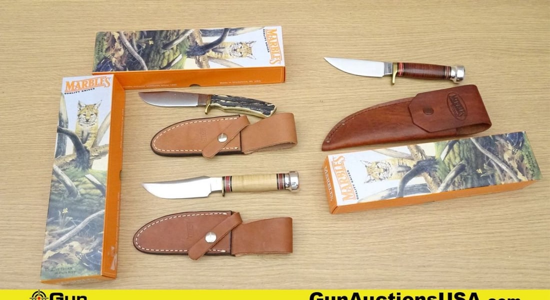Marble's Fixed Blade Knives. New in Box. Lot of 3; 1- BISON CURLY Maple Aluminum. 1- PLAINSMAN: Marble's Fixed Blade Knives. New in Box. Lot of 3; 1- BISON CURLY Maple Aluminum. 1- PLAINSMAN Leather and Aluminum. 1- MARLIN Camp Craft 2000. . (68278)