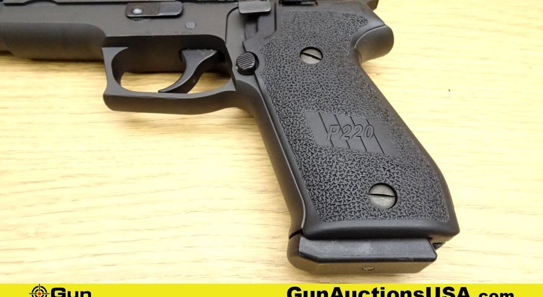 SIG P220 45ACP Pistol. Excellent. 4.25" Barrel. Shiny Bore, Tight Action Semi Auto Features Black: SIG P220 45ACP Pistol. Excellent. 4.25" Barrel. Shiny Bore, Tight Action Semi Auto Features Black Polymer Stippled Grips, Serrated Hammer Spur and Trigger, White Dot Front Sight, Notch Rear Sight, DA/