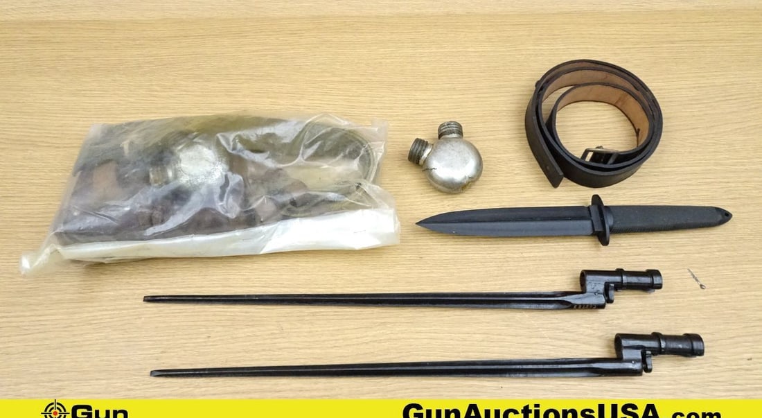 Military Surplus Mosin Nagant, Etc. . Good Condition. Lot of 8; 1-Training Knife. 2- Mosin Nagant: Military Surplus Mosin Nagant, Etc. . Good Condition. Lot of 8; 1-Training Knife. 2- Mosin Nagant Bayonets. 1 Leather Sling. 1- Canvas Sling. 1- Dual Cartridge Carry Pouch. 2- Metal Oilers. . (68978)