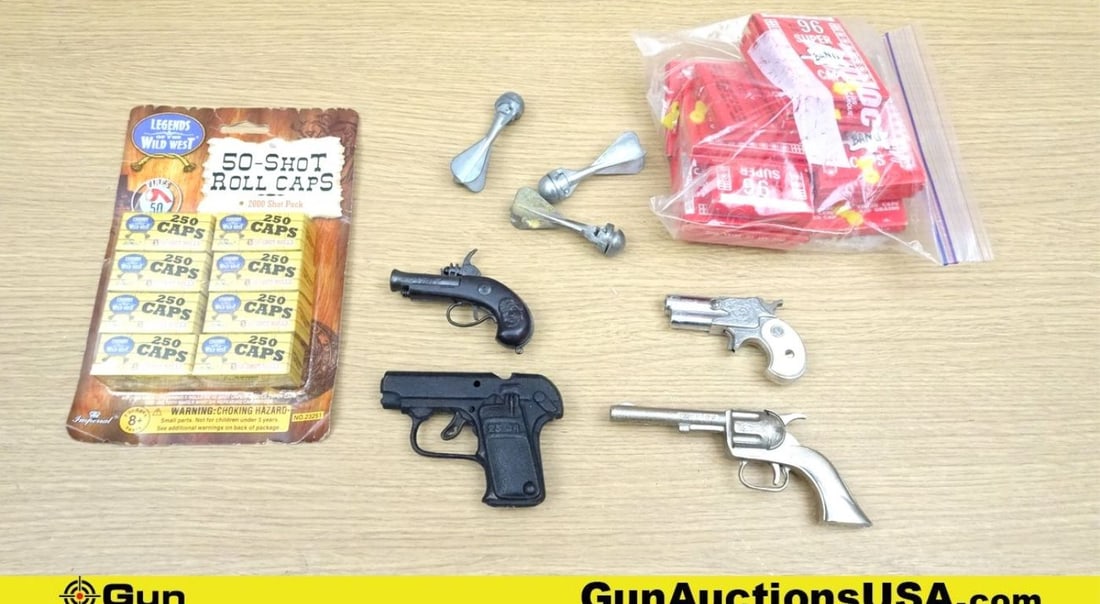 Buddy L TOYS, Etc. Cap Guns & Caps. Lot of 9; 3- Antique Cap Guns, 3- Antique Cap Grenades, 11-: Buddy L TOYS, Etc. Cap Guns & Caps. Lot of 9; 3- Antique Cap Guns, 3- Antique Cap Grenades, 11- Boxes of 96 Super Caps, & 8- 250 Pc Boxes of 50 Shot Roll Caps.. (69964)