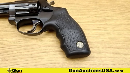 Taurus M94 .22 LR NEVER FIRED Revolver. Excellent. 4" Barrel. Shiny Bore, Tight Action A reliable