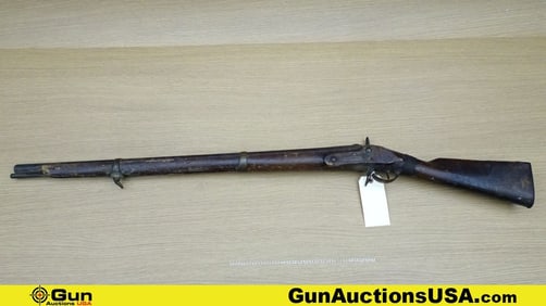 .70 Caliber Rifle . 32" Barrel. Percussion Features Straight Grained Wood Stock, Metal Butt Plate,
