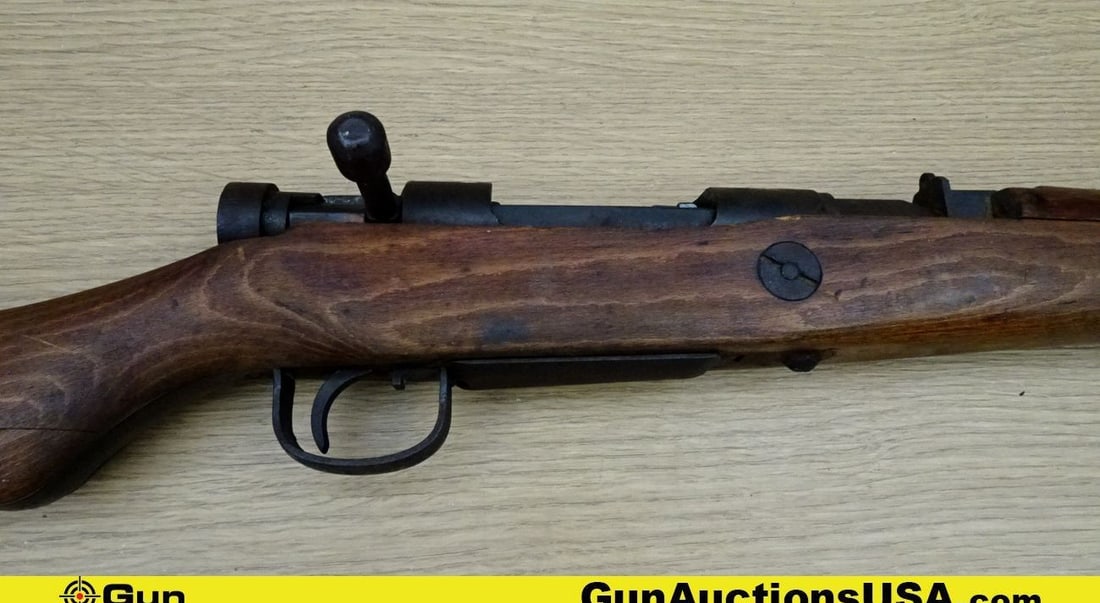 NAGOYA ARSENAL TYPE 38 6.5 JAP Rifle. Fair Condition. 26" Barrel. Tight Action Bolt Action JAPANESE: NAGOYA ARSENAL TYPE 38 6.5 JAP Rifle. Fair Condition. 26" Barrel. Tight Action Bolt Action JAPANESE ARISAKA TYPE 38, MUM on Top Front of Receiver, Front Blade Sight, Peep Rear Sight with a Internal Ma