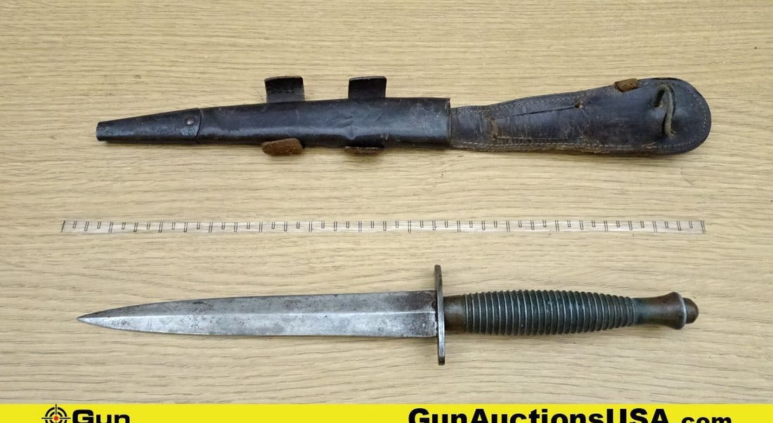 Fairbairn-SYKES THIRD PATTERN COLLECTOR'S Daggar. Very Good. #2 Stamping on Hilt and #15 with ARROW: Fairbairn-SYKES THIRD PATTERN COLLECTOR'S Daggar. Very Good. #2 Stamping on Hilt and #15 with ARROW on Top of Grip Just below the Hilt. Metal Grip, Double Sided Blade Dagger Style with Original Leathe