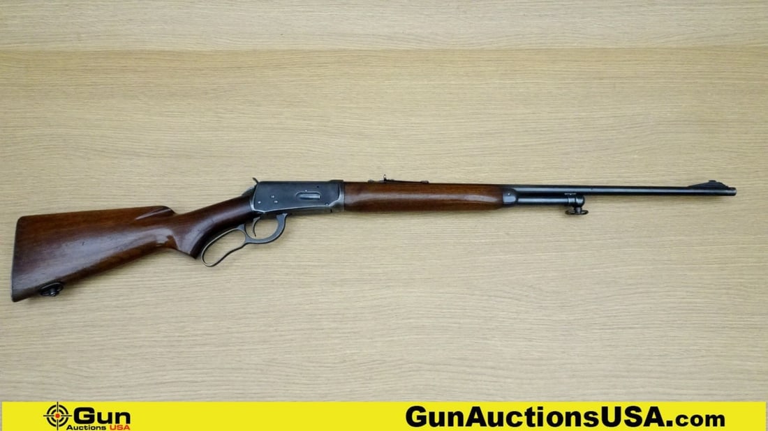 Winchester 64 30-30 WIN Rifle. Good condition, Normal Handling Marks, Scattered Spotting and/or: Winchester 64 30-30 WIN Rifle. Good condition, Normal Handling Marks, Scattered Spotting and/or Pitting. 24.25" Barrel. Shiny Bore with Light Pitting, Tight Action Lever Action Features Straight Grain