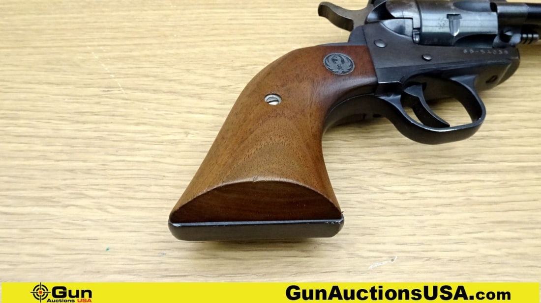 Ruger NEW MODEL SINGLE SIX .22 LR Revolver. Good condition, Normal Handling Marks, Scattered: Ruger NEW MODEL SINGLE SIX .22 LR Revolver. Good condition, Normal Handling Marks, Scattered Spotting and/or Pitting. 4 5/8" Barrel. Shiny Bore, Tight Action Features a 6 Shot Fluted Cylinder, Serrate