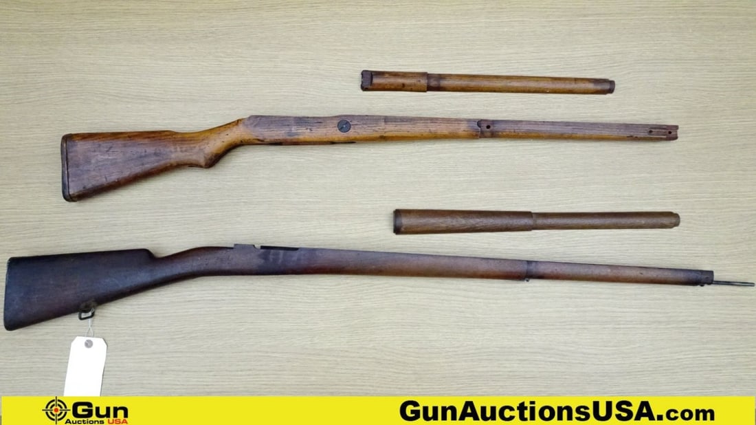 Arisaka, Etc. Rifle Stocks. Good Condition. Lot of 2; 1- Arisaka Wooden Two Piece Rifle Stock, Sling: Arisaka, Etc. Rifle Stocks. Good Condition. Lot of 2; 1- Arisaka Wooden Two Piece Rifle Stock, Sling loop. 1- Two Piece Wooden Rifle Stock with Cleaning Rod and Metal Butt Plate. Circular Cartouche wi