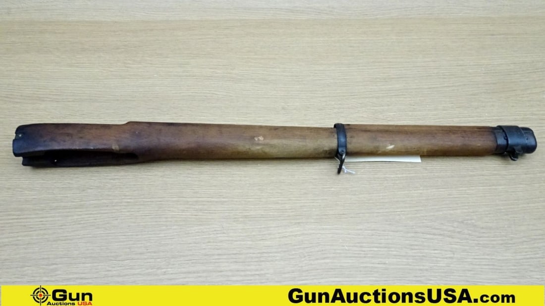 Rifle Stocks. Good Condition. Lot of 2; 1-Wooden Enfield Stock with Sling Swivels, Two Barrel Bands: Rifle Stocks. Good Condition. Lot of 2; 1-Wooden Enfield Stock with Sling Swivels, Two Barrel Bands and Metal Butt Plate. 1- Polymer Stock with a Sling Swivel, Top Forward Hand Guard Piece, Metal Butt