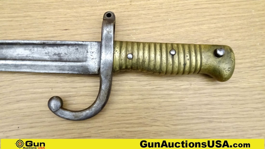 Military Surplus Infantry Saber VINTAGE Bayonet. Very Good. French Regulation Yatagan Model 1868: Military Surplus Infantry Saber VINTAGE Bayonet. Very Good. French Regulation Yatagan Model 1868 Infantry Bayonet, 22 1/2 " Blade and 27 1/2 " Overall Length, Brass Hilt, and a Fuller 2/3 Length of Bl
