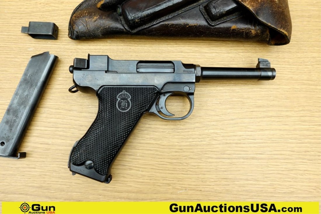 HUSQVARNA VAPENFABRIKS A.B. M/40 LAHTI 9MM LUGER MATCHING NUMBERS Pistol. Very Good. 5" Barrel.: HUSQVARNA VAPENFABRIKS A.B. M/40 LAHTI 9MM LUGER MATCHING NUMBERS Pistol. Very Good. 5" Barrel. Shiny Bore, Tight Action Semi Auto ALL MATCHING NUMBERS! Features a Deep Blued Finish, Black Bakelite Te