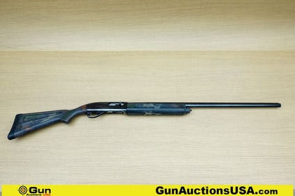 Remington 1100 12 GA. MAGNUM Shotgun. Good condition, Normal Handling Marks, Scattered Spotting