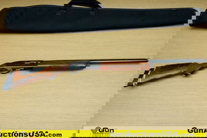 Remington 1100 12 ga. Shotgun. Good condition, Normal Handling Marks, Scattered Spotting and/or