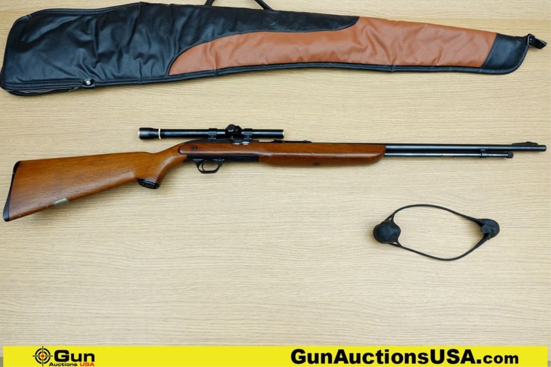 J.C. HIGGINS 31 .22 LONG OR LR Rifle. Good condition, Normal Handling Marks, Scattered Spotting: J.C. HIGGINS 31 .22 LONG OR LR Rifle. Good condition, Normal Handling Marks, Scattered Spotting and/or Pitting. 24" Barrel. Shiny Bore, Tight Action Semi Auto Features Straight Grained Wood Stock, Adj