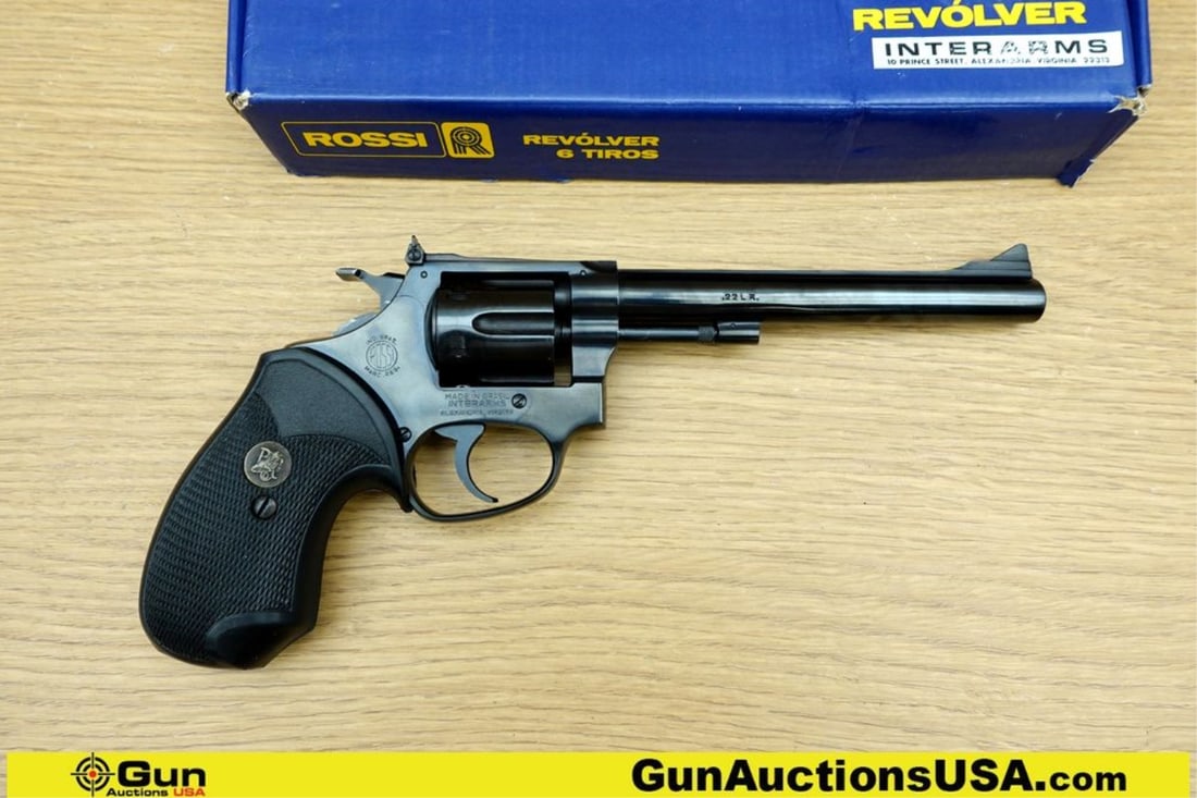 ROSSI M51 .22 LR Revolver. Excellent. 6" Barrel. Shiny Bore, Tight Action Features a Fixed Blade: ROSSI M51 .22 LR Revolver. Excellent. 6" Barrel. Shiny Bore, Tight Action Features a Fixed Blade Front Sight, Adjustable Notch Rear Sight, with a Deep Blue Finish on Barrel, Frame and a Six Shot Flute