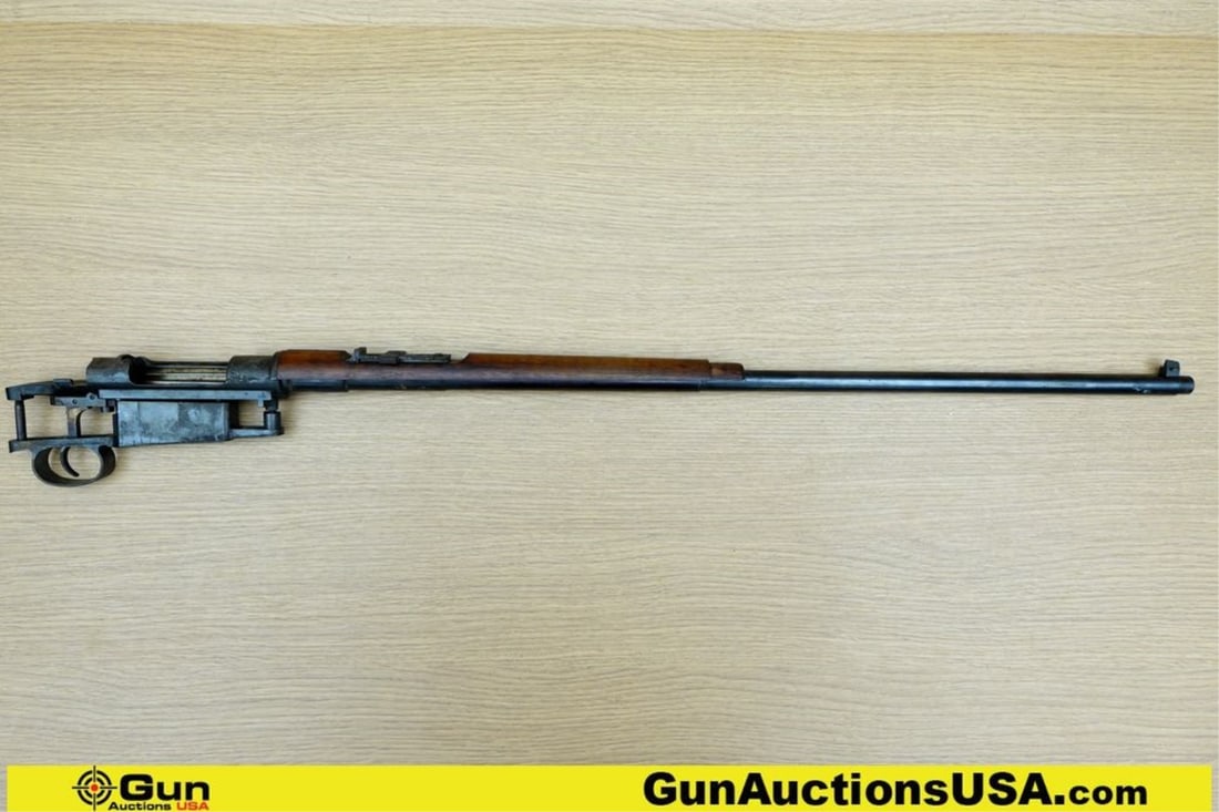 LOEWE BERLIN 1895 7X57 Rifle Action . Good condition, Normal Handling Marks, Scattered Spotting: LOEWE BERLIN 1895 7X57 Rifle Action . Good condition, Normal Handling Marks, Scattered Spotting and/or Pitting. 29" Barrel. Shiny Bore Bolt Action Barreled Action- Features a Front Blade Sight, Flip U