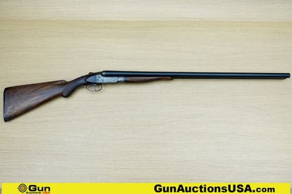 ITHACA GUN CO SXS 12 ga. Shotgun. Good condition, Normal Handling Marks, Scattered Spotting and/or
