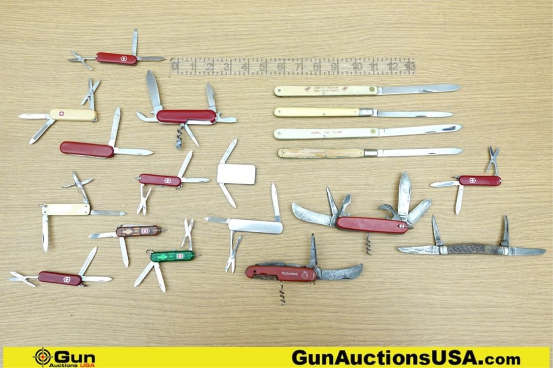 Swiss Army, Etc. Knives. Lot of 19; Folding Pocket Knives. 1-Salami Knife w/Broken Grips.. (67562): Swiss Army, Etc. Knives. Lot of 19; Folding Pocket Knives. 1-Salami Knife w/Broken Grips.. (67562) (GSCM79)