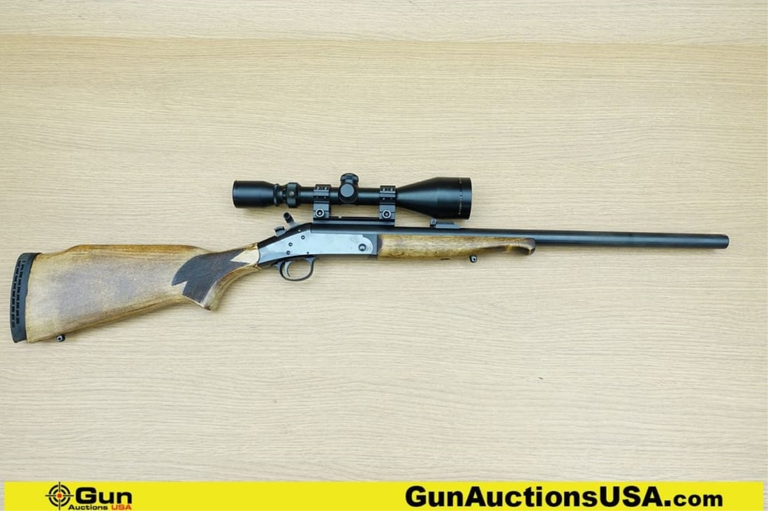 New England HANDI RIFLE SB2 .44 REM MAGNUM HEAVY BLUED BARREL Rifle. Good condition, Normal Handling: New England HANDI RIFLE SB2 .44 REM MAGNUM HEAVY BLUED BARREL Rifle. Good condition, Normal Handling Marks, Scattered Spotting and/or Pitting. 22" Barrel. Shiny Bore, Tight Action Break Action Feature