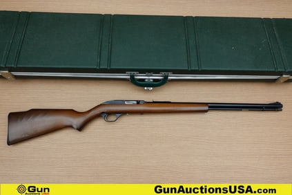 MARLIN 60 .22 LR Rifle. Good condition, Normal Handling Marks, Scattered Spotting and/or Pitting.