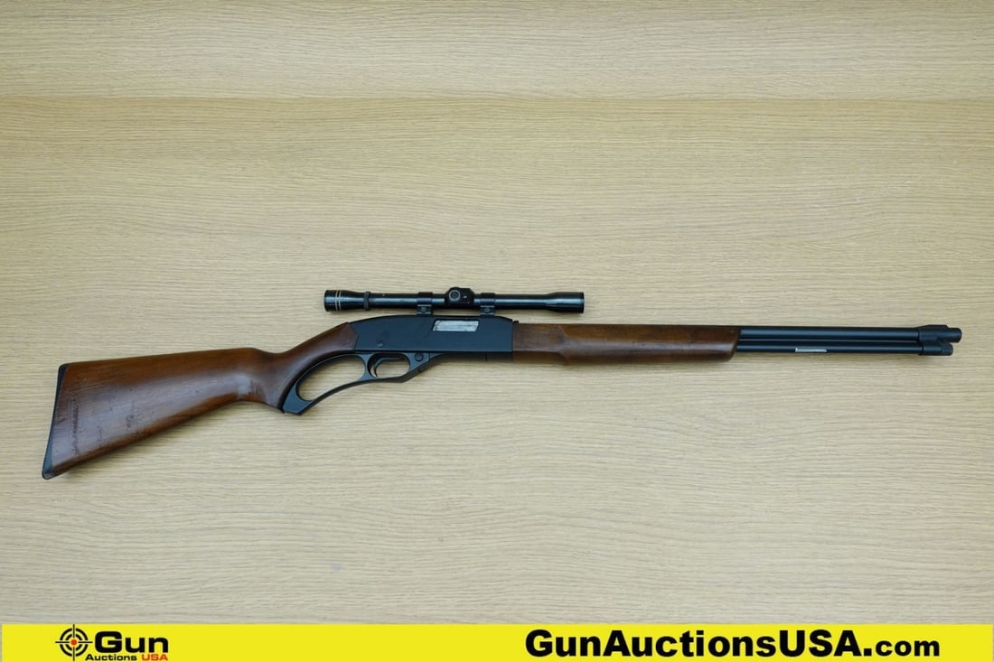 Winchester Model 250 .22 S-L-LR Rifle. Good condition, Normal Handling Marks, Scattered Spotting an: Winchester Model 250.22 S-L-LR Rifle. Good condition, Normal Handling Marks, Scattered Spotting and/or Pitting. 20.5" Barrel. Shiny Bore, Tight Action Lever Action Features Matte Black Barreled Action
