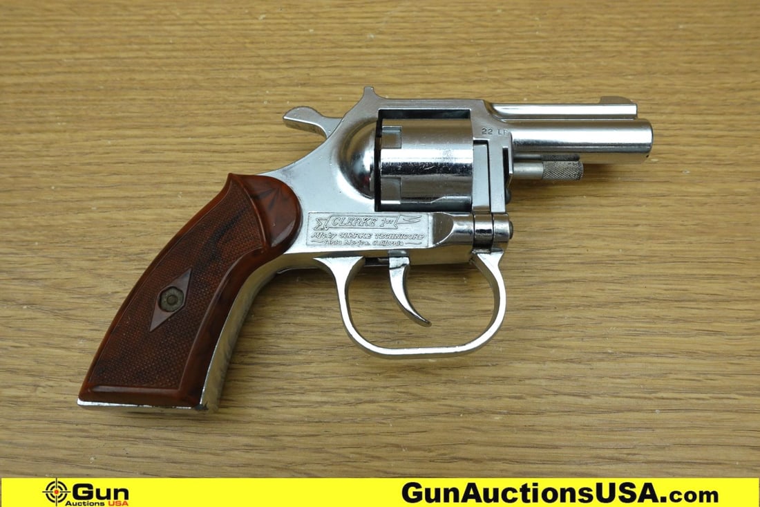 CLERKE TECHNICORP CLERKE 1ST .22 LR Revolver. Very Good. 2 1/8" Barrel. Shiny Bore, Tight Action: CLERKE TECHNICORP CLERKE 1ST .22 LR Revolver. Very Good. 2 1/8" Barrel. Shiny Bore, Tight Action Compact DA/SA Revolver, Chrome Plated, with Fixed Front Sight, Fixed Notched Rear Sight, Brown Bakelite
