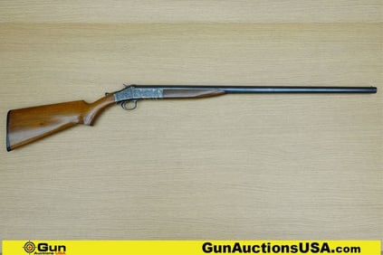 H&R SINGLE SHOT BREAK 12 ga. Shotgun. Good condition, Normal Handling Marks, Scattered Spotting