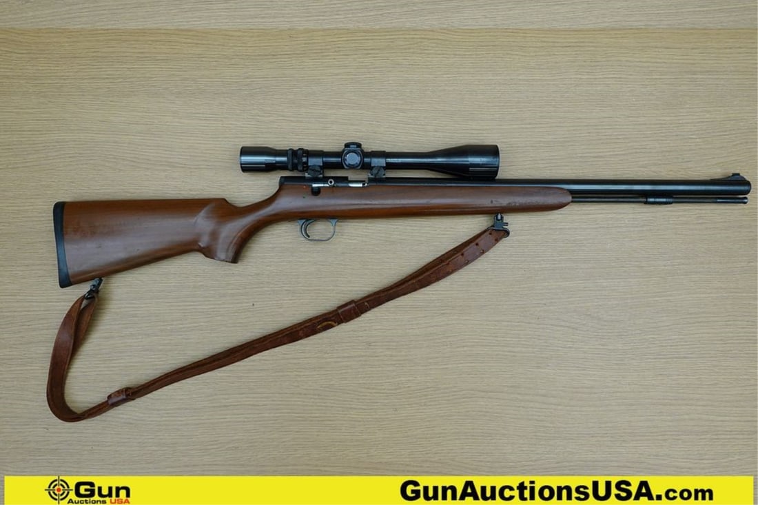 Thompson Center THUNDER HAWK .50 Cal Rifle. Good condition, Normal Handling Marks, Scattered: Thompson Center THUNDER HAWK .50 Cal Rifle. Good condition, Normal Handling Marks, Scattered Spotting and/or Pitting. 21.5" Barrel. Bolt Action Features a Blackened Barreled Action with Adjustable Fro