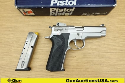 S&W 4006 40 S&W Pistol. Very Good. 4" Barrel. Shiny Bore, Tight Action Semi Auto This robust sidearm