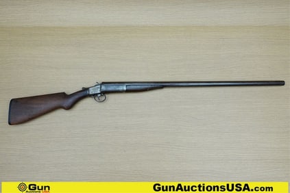 AMERICAN CHAMPION 12 ga. Shotgun. Good condition, Normal Handling Marks, Scattered Spotting and/or
