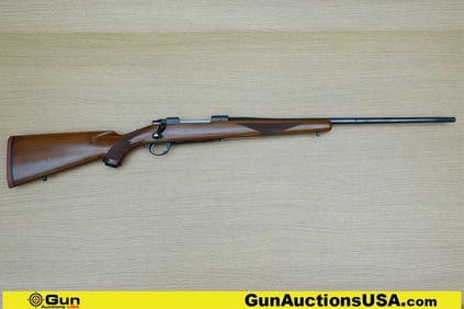 Ruger M77 7MM REM MAGNUM Rifle. Very Good. 24.5" Barrel. Shiny Bore, Tight Action Bolt Action