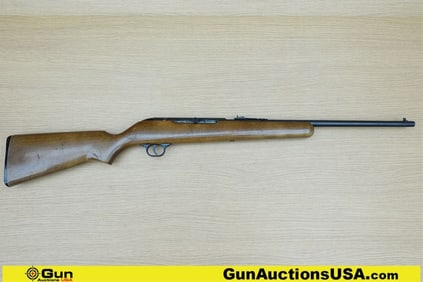 MOSSBERG 380 .22 LR Rifle. Good condition, Normal Handling Marks, Scattered Spotting and/or Pitting.