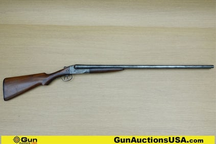 ITHACA SXS 12 ga. Shotgun. Good condition, Normal Handling Marks, Scattered Spotting and/or Pitting.